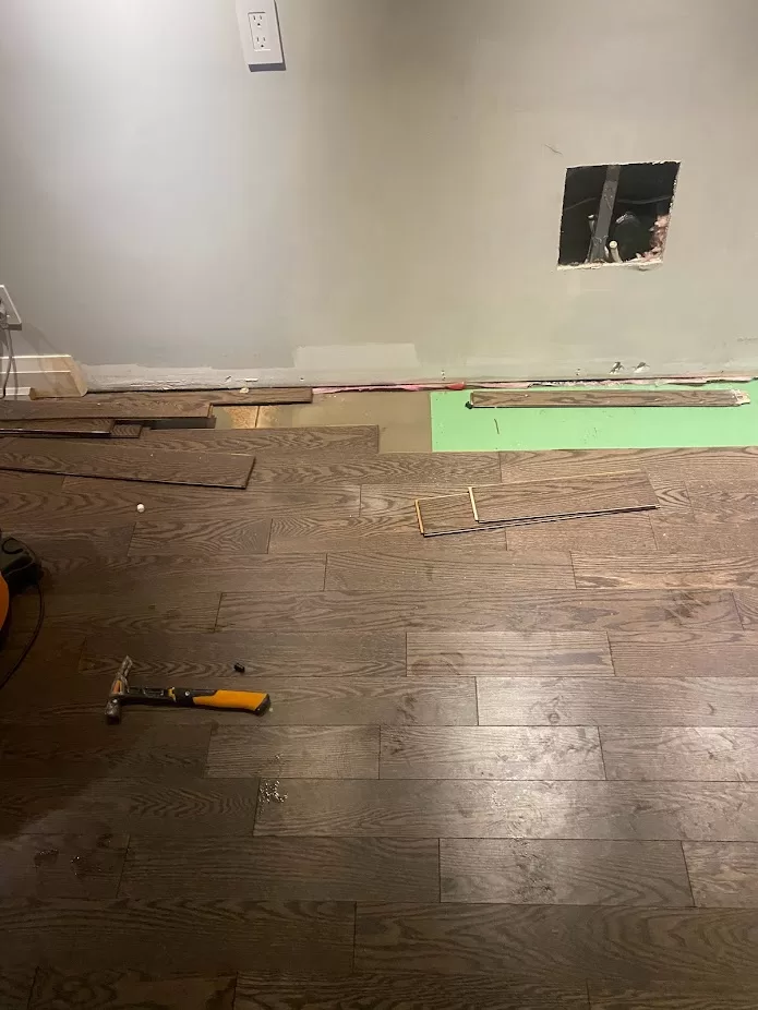Gillard Avenue basement flooring before 1