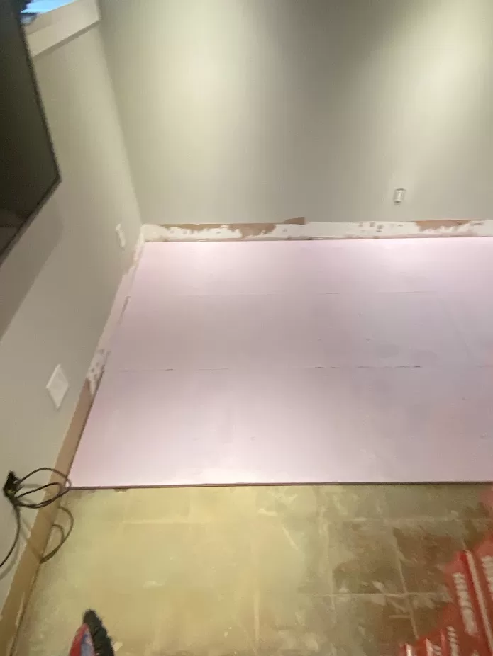 Gillard Avenue basement flooring before 2