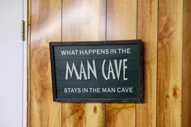Man Cave sign says that what happens in the mancave stays there.