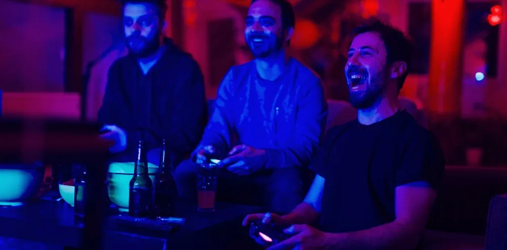 friends gaming in a mancave after a basement renovation by JG Contracting in Toronto Ontario Canada