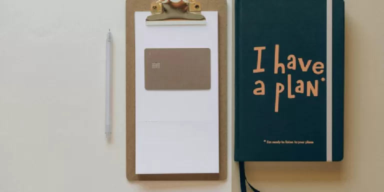 Journal clipboard and pen for making a plan