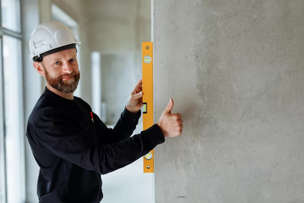 Professional Contractor holding thumbs up