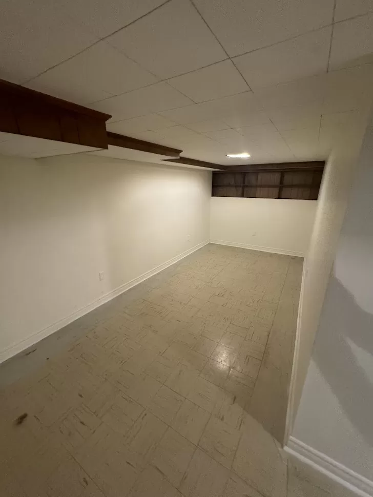 basement hallway before
