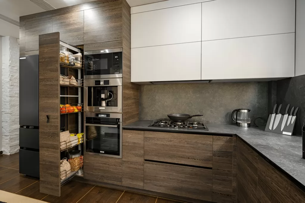 Kitchen cabinets with full‑extension drawers and recycling centre in Toronto home.