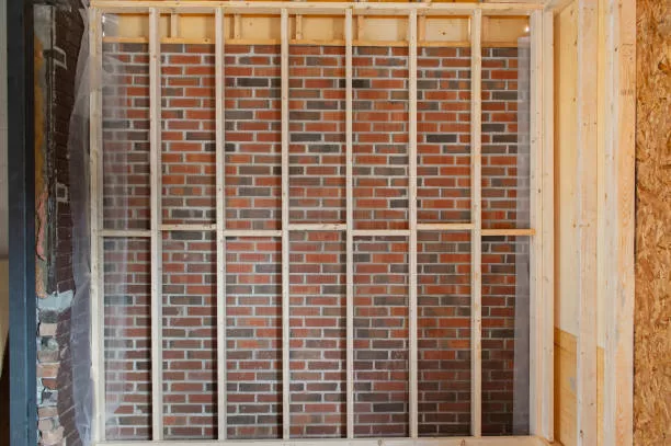 Temporary shoring for load‑bearing wall removal in a Toronto home renovation.