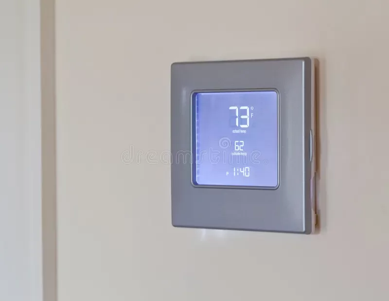 Programmable heated floor thermostat installed in Toronto bathroom.