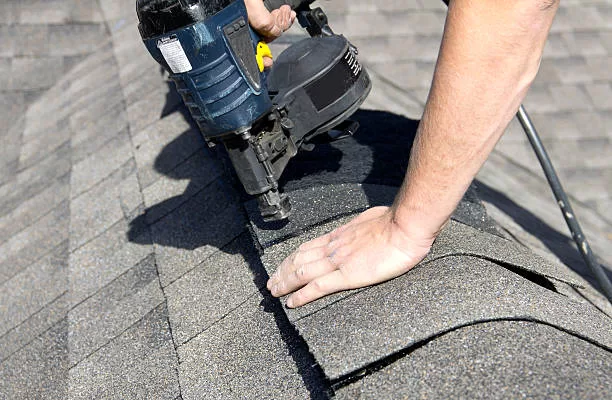 Ridge vent added for attic exhaust ventilation in Toronto renovation.