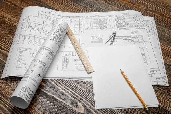 Toronto deck building permit drawings and measurements on a contractor’s bench.