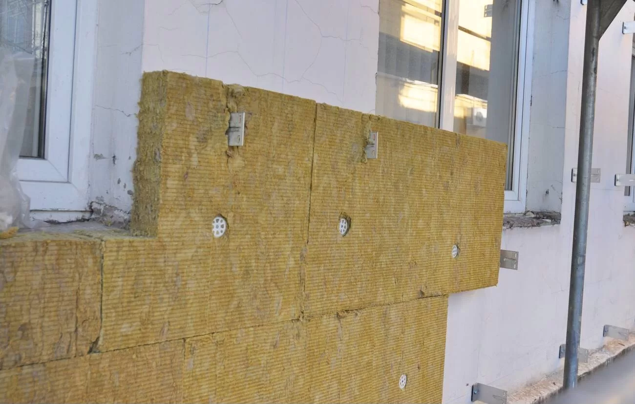 Exterior mineral wool insulation installed with vertical furring on a Toronto home.