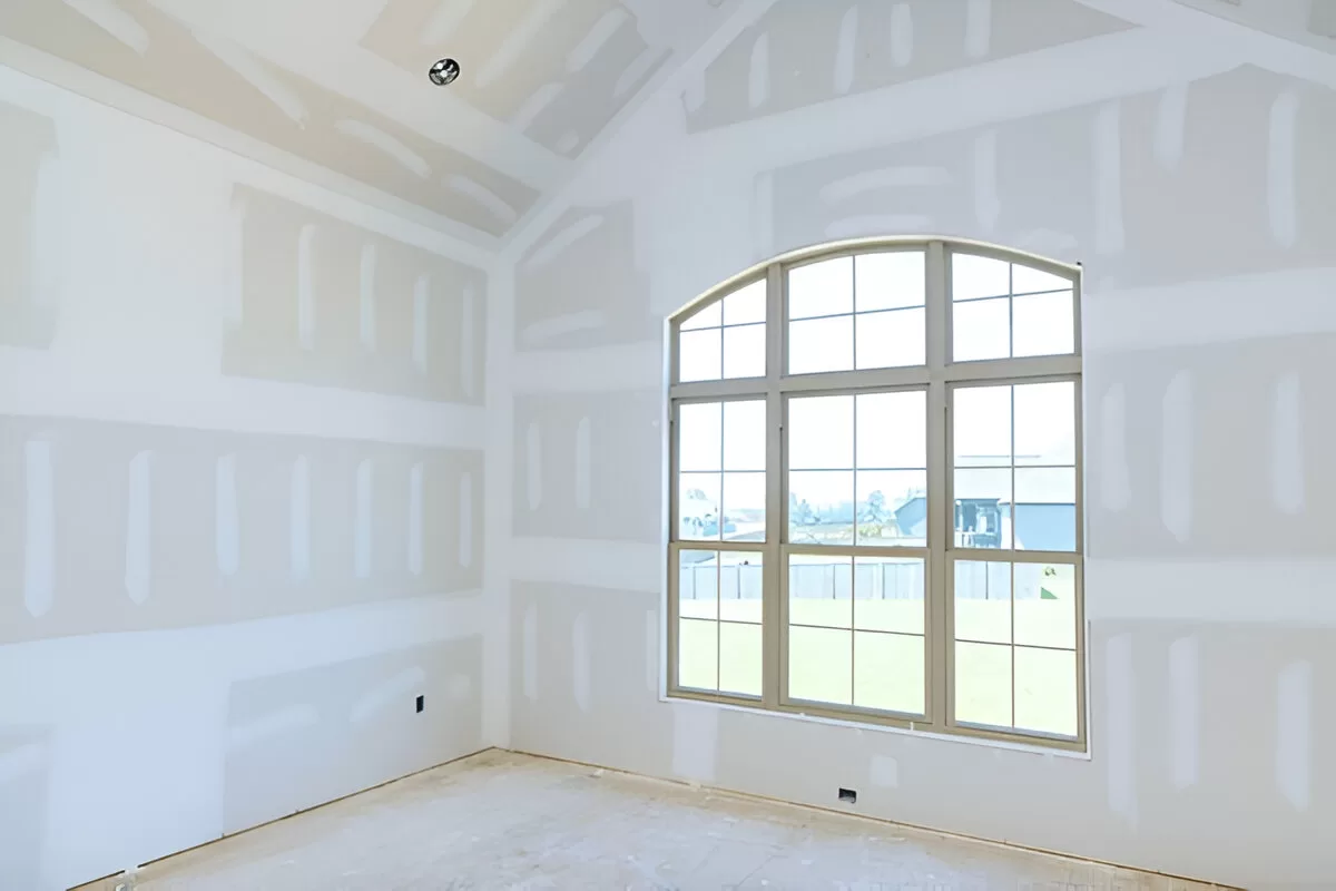Drywall repair and spot‑priming process before interior painting in a Toronto home.