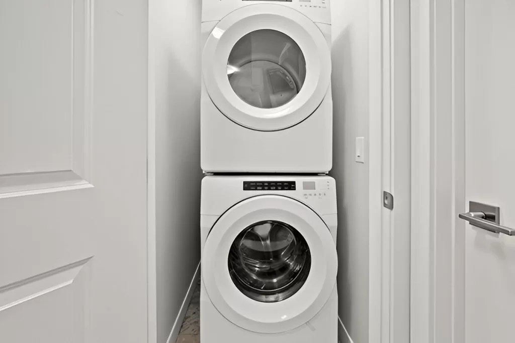 Toronto laundry room with stacked washer dryer.