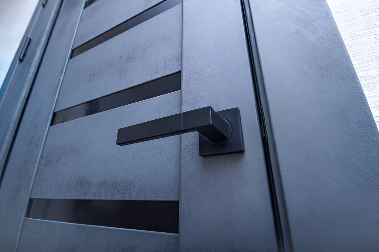 Solid‑core door with sweep to keep mudroom noise down.