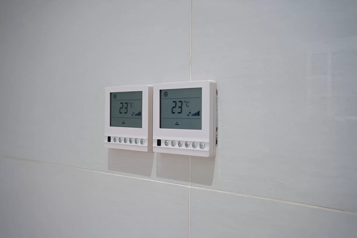 Radiant floor and ventilation controls in a Toronto bathroom - Toronto Aging‑in‑Place.