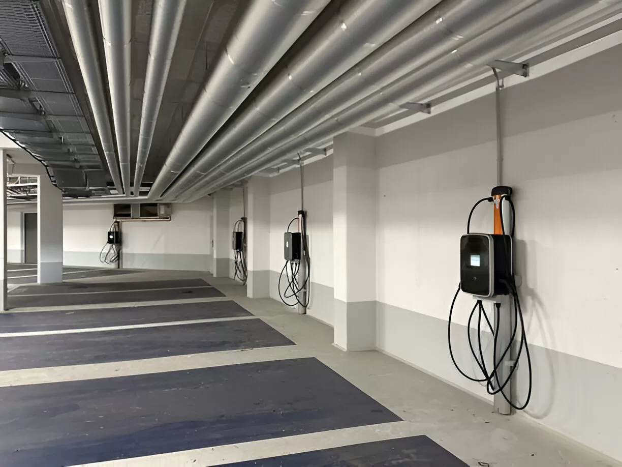 Condo parking stall with EV conduit run and wallbox.