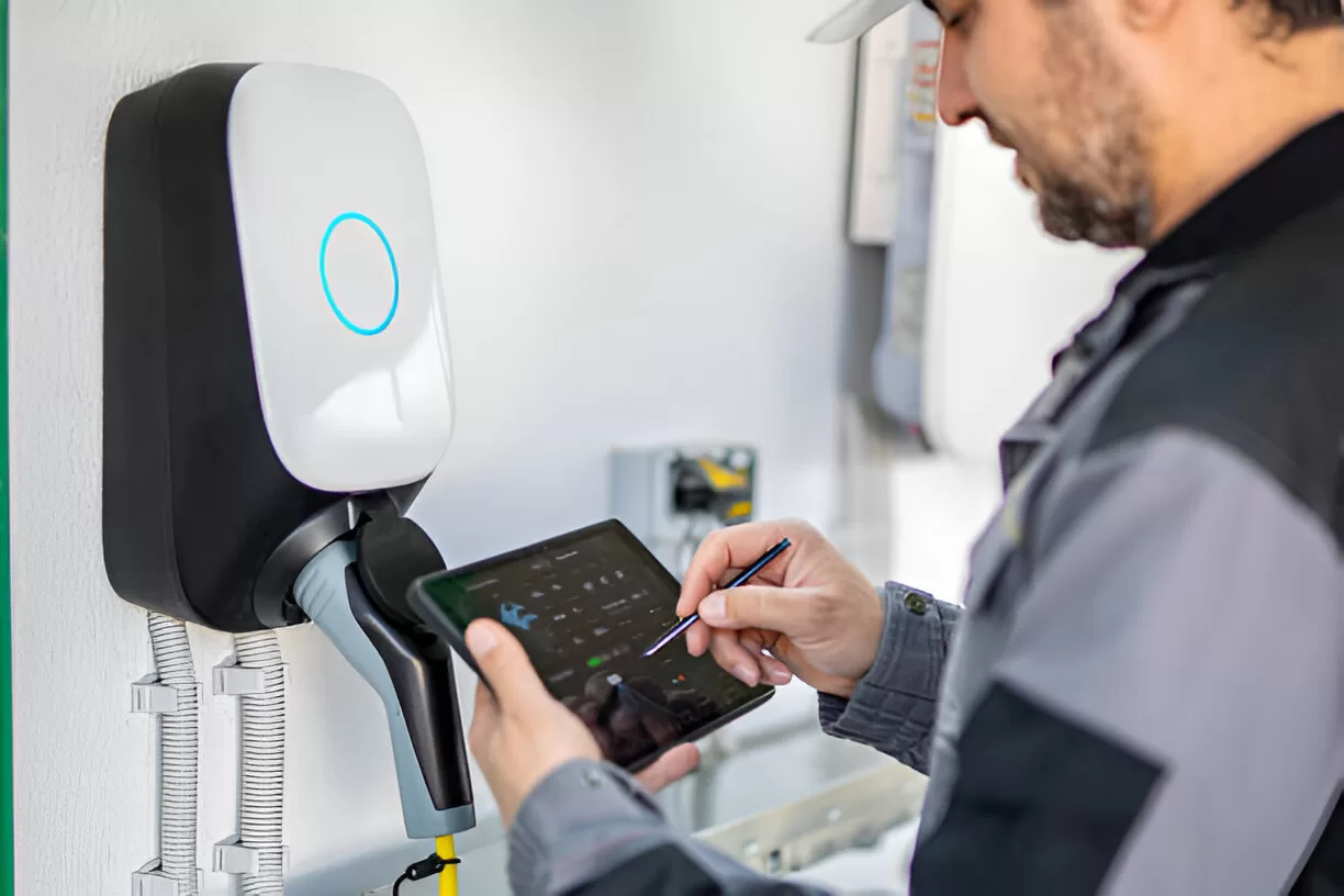 Licensed electrician installing EV charger.