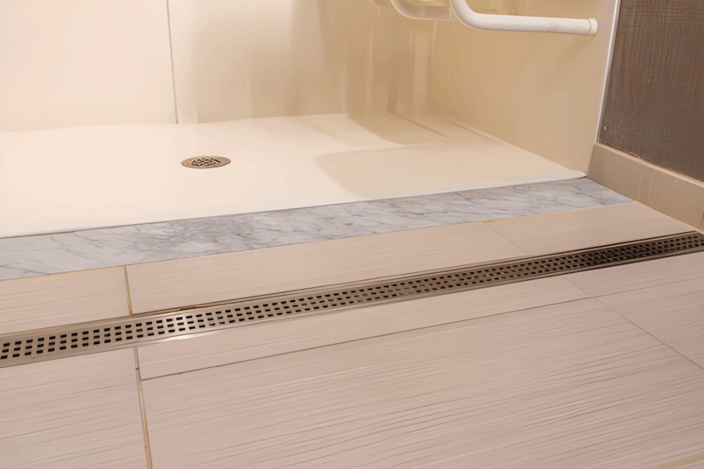 Modern Toronto bathroom with curbless shower and linear drain