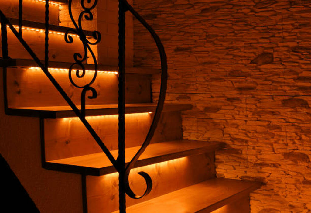 Exterior concrete steps with integrated LED step lights showing safe path.