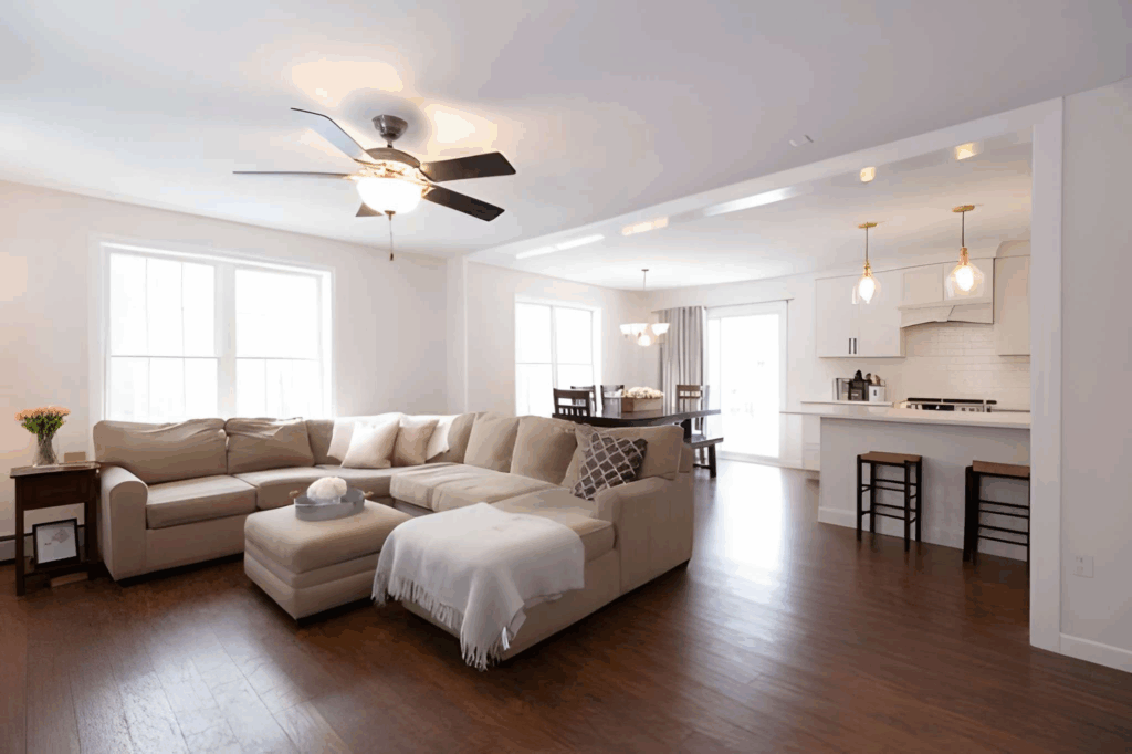 Rear addition with open concept kitchen, dining area, and family room looking to the backyard.