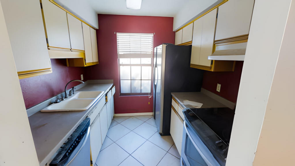 Before renovation of a narrow galley condo kitchen