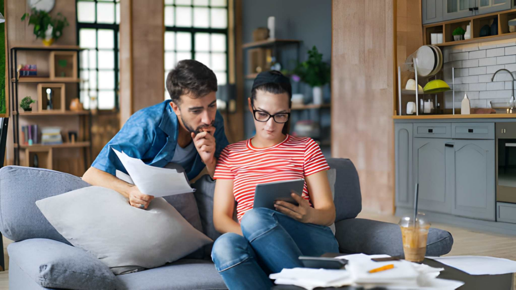 homeowners reading warranty documents for renovation products.