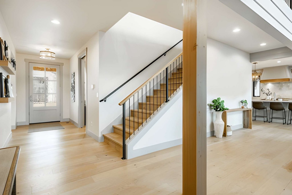 explore our work image 4 - modern front entrance hardwood flooring & stairs