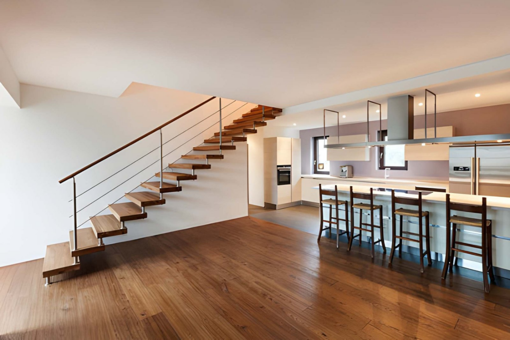 modern kitchen & staircase from a fully renovated home