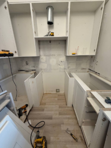 Windermere Avenue kitchen renovation process, partially done cabinets