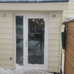 Roselawn Ave Mudroom & Powder Room Additions result. Entrance siding close up