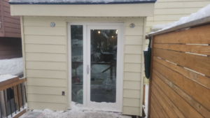 Roselawn Ave Mudroom & Powder Room Additions result. Entrance siding close up
