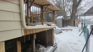 Roselawn Ave Mudroom & Powder Room Additions result. Deck from ground level
