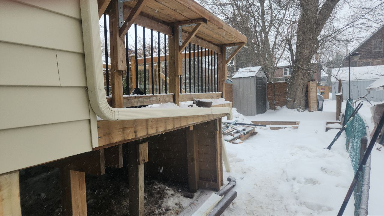 Roselawn Ave Mudroom & Powder Room Additions result. Deck from ground level