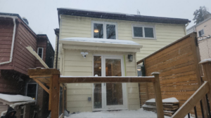 Roselawn Ave Mudroom & Powder Room Additions result. Deck & entrance siding