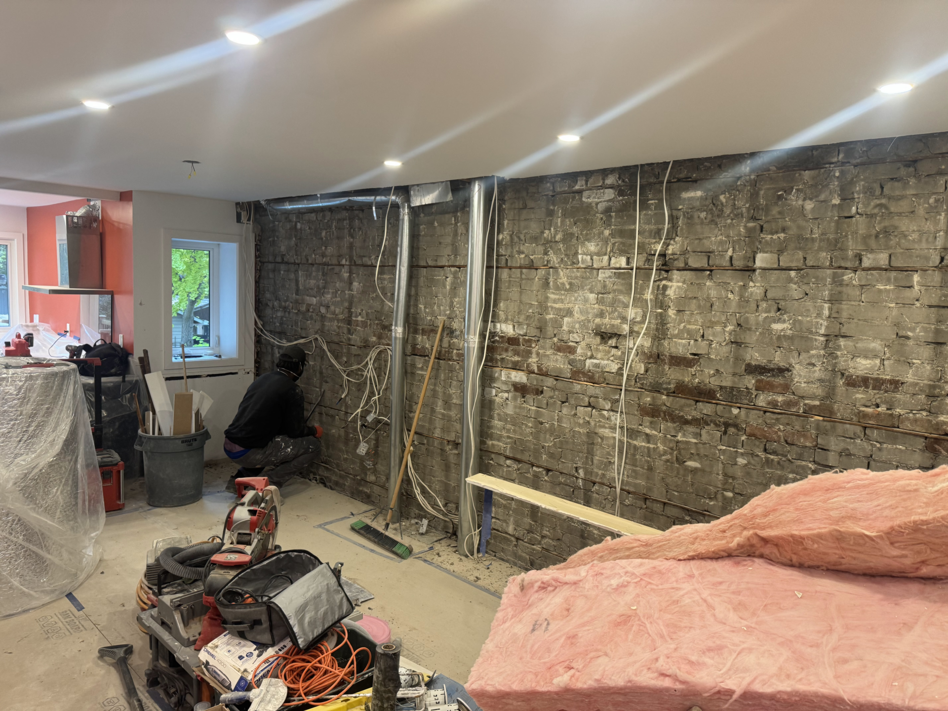 Roselawn Ave process. living room wall stripped