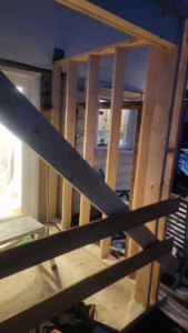 Roselawn Ave process mudroom wall framing